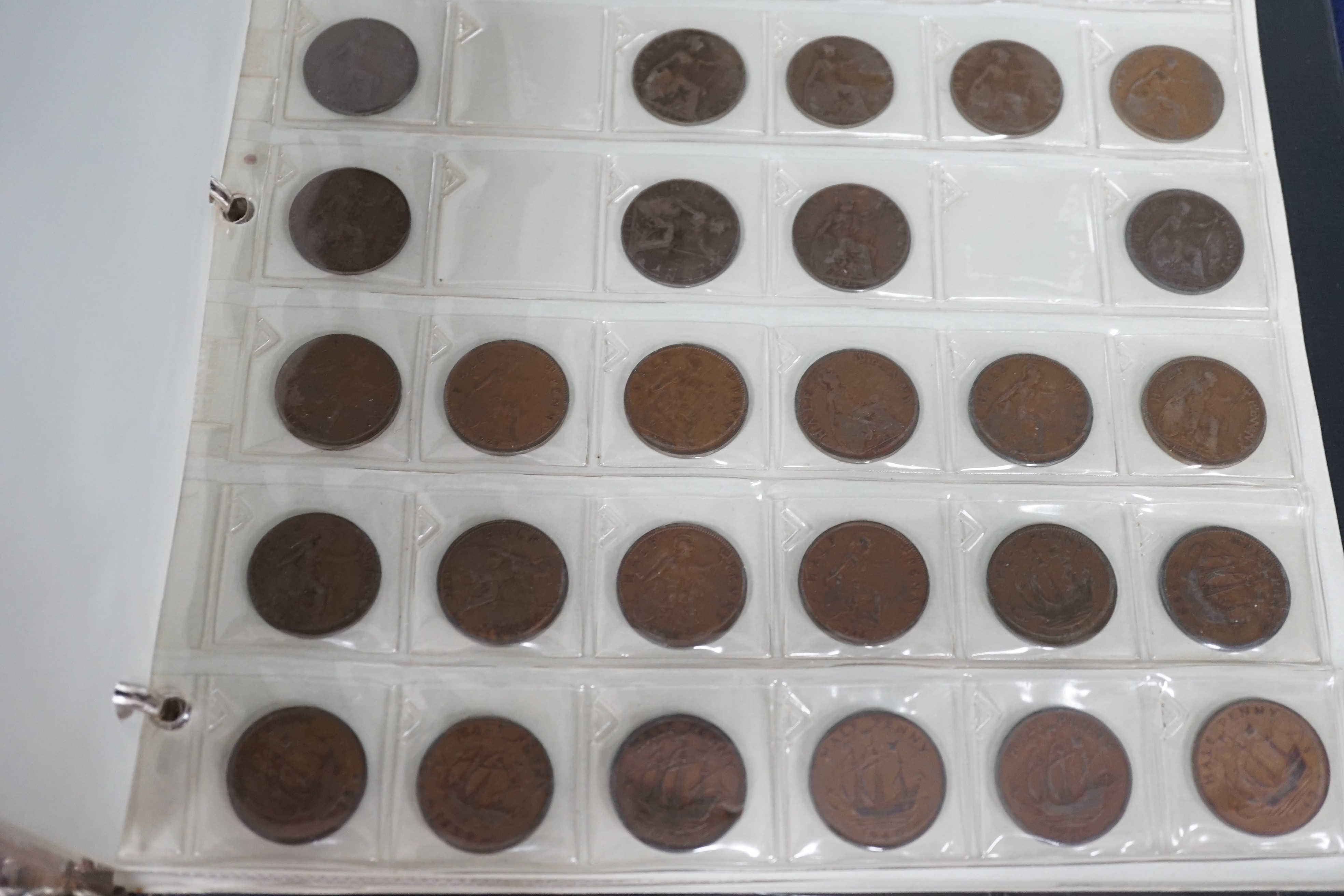 An album of British half pennies and farthings, Charles II to QEII, half pennies include 1730 F, 1806 UNC, 1827 GVD, 1877 lustrous UNC, Farthings including 1788 VF, 1799 EF, 1821 EF and decimal pennies